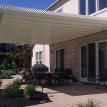 large lattice pergola cover with Roman columns